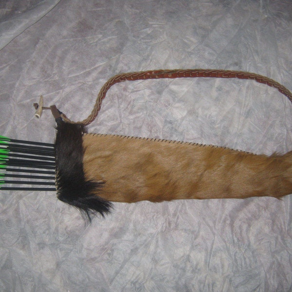 Roe deer skin quiver , with goatskin cuff . (functional) .