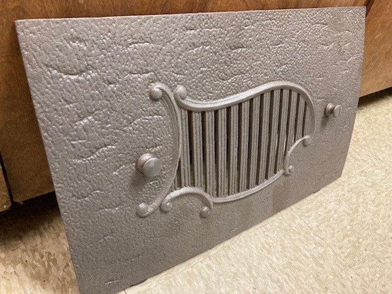 Vintage Cast Iron Fireplace Cover With Pebble Grain Detail and Original