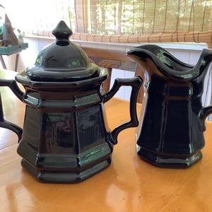 Ceramic pottery black creamer and sugar(covered), handcrafted in 1976