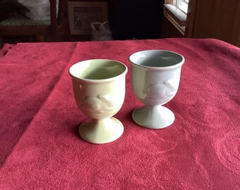 2 Hallmark egg cups, blue and green