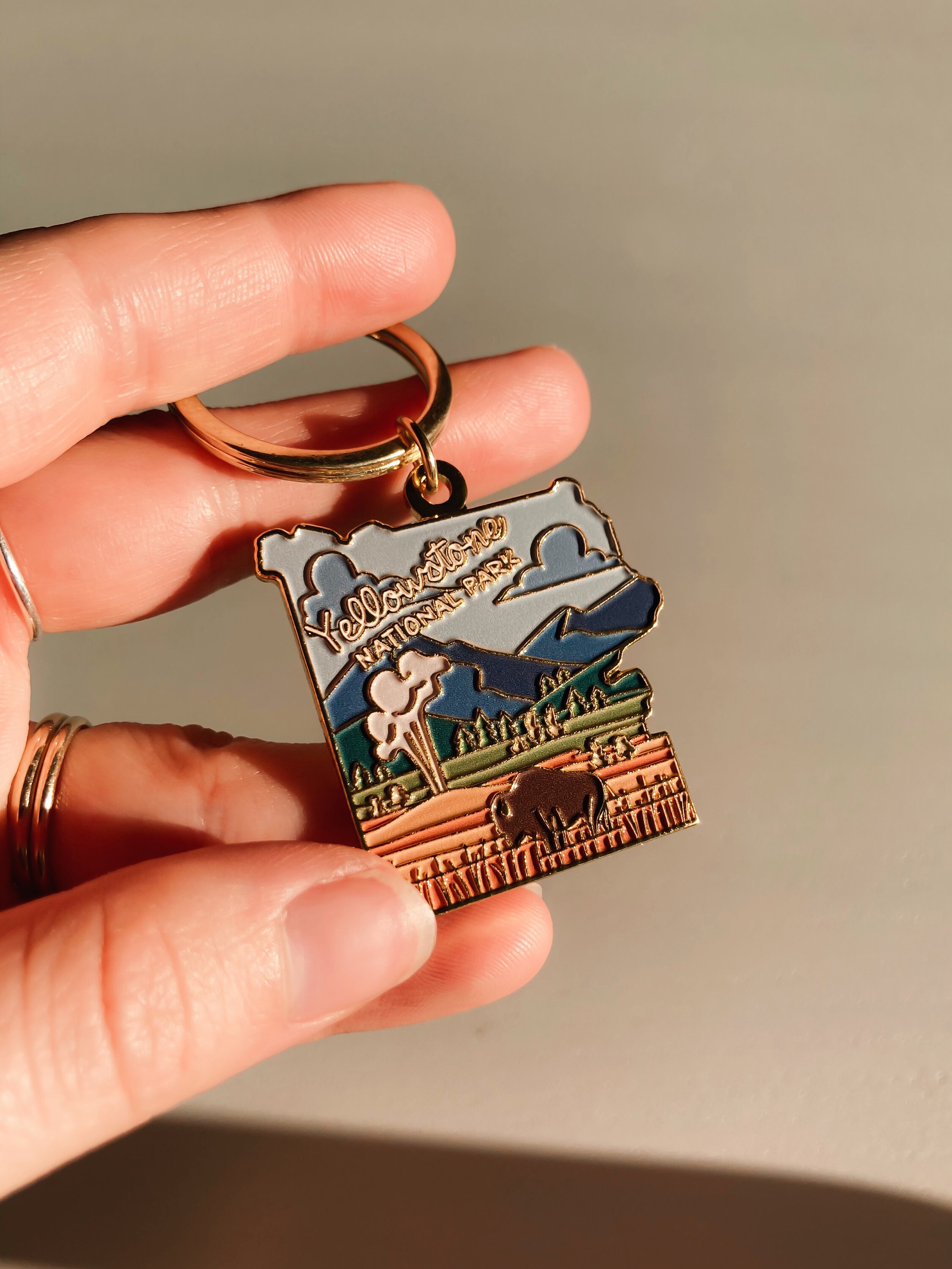 Yellowstone Gold Enamel Keychain | National Park Key Ring | Soft Enamel Illustrated Keychain | Yellowstone National Park Gift | 1.5&quot;