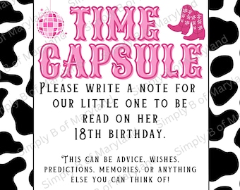 May include: A white and black cow print background with a pink and white sign that says "Time Capsule". The sign also says "Please write a note for our little one to be read on her 18th birthday. This can be advice, wishes, predictions, memories, or anything else you can think of!"