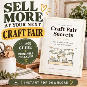 May include: A 13-page guide titled Craft Fair Secrets with a printable checklist. The cover features a line drawing of a market stall, the text A Crafter's Guide, and the author name Deidre Our Upcycled Life. The text Sell More At Your Next Craft Fair is displayed prominently.