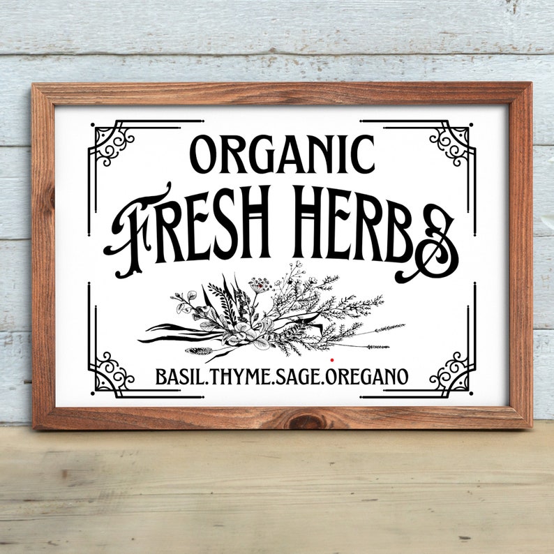 May include: A framed sign with the words "ORGANIC FRESH HERBS" in black script. The sign includes a botanical illustration and the names of herbs: basil, thyme, sage, and oregano. The frame is made of wood.