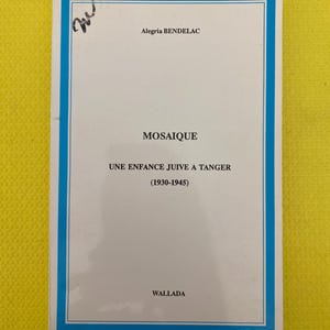 May include: A book titled "MOSAIQUE" by Alegria Bendelac, with the subtitle "UNE ENFANCE JUIVE A TANGER (1930-1945)". The cover is white with a blue border and text. The publisher is Wallada.