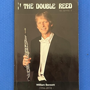 May include: A magazine cover featuring a man in a tuxedo holding an oboe. The title reads "THE DOUBLE REED" with the volume and issue number. The cover also includes the name "William Bennett (1956-2013)".