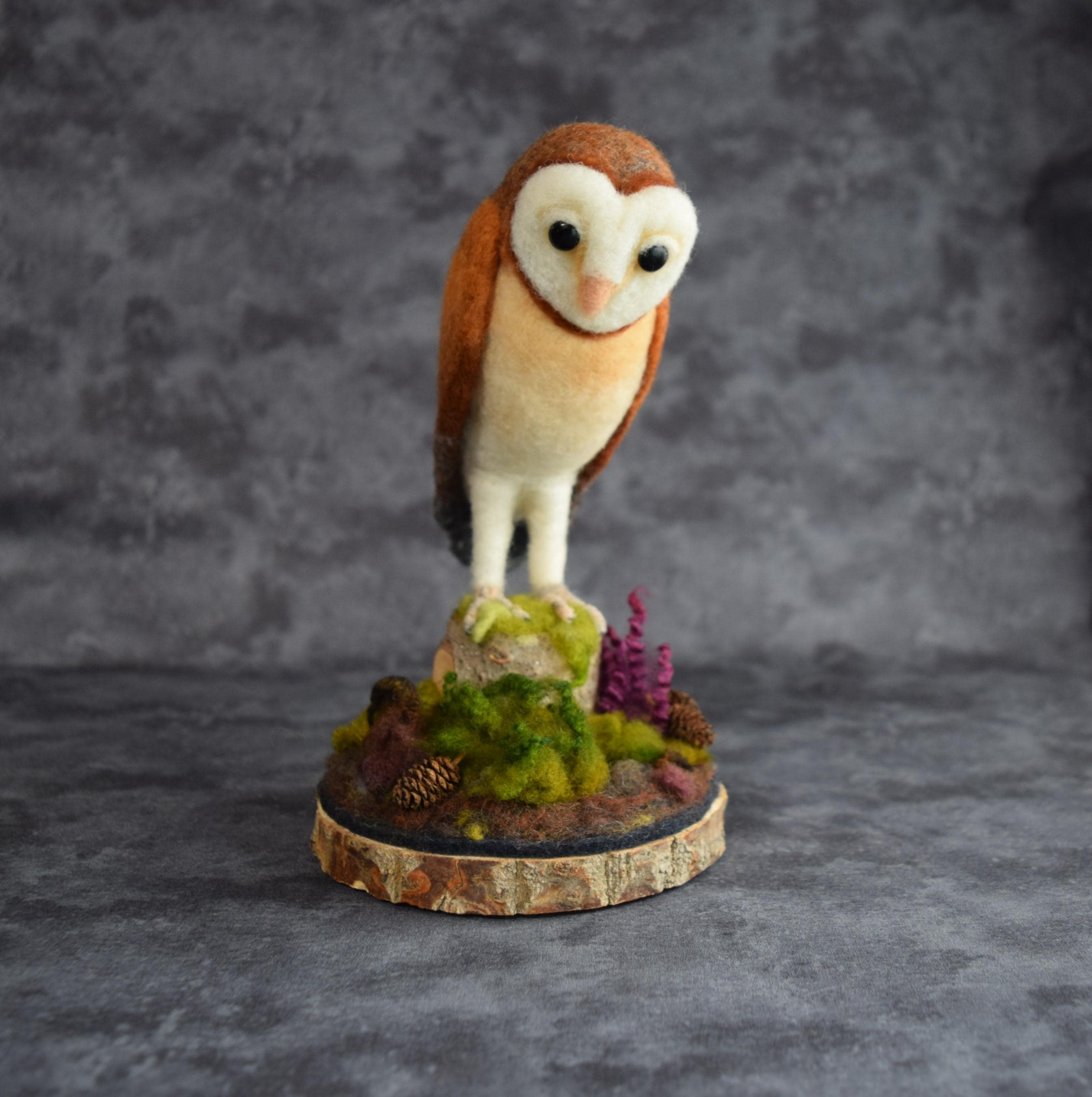 Needle felted wool owl sculpture, barn owl on a mossy stump