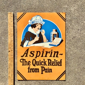 Rare publicité d'affichage de magasin peinte à la main d'aspirine vintage « Le soulagement rapide de la douleur »