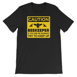 Funny Bee Keeper T-Shirt | Caution Bee Keeper If You See Me Running Try To Keep Up | Bees | Bee Keeping | Short-Sleeve Unisex T-Shirt