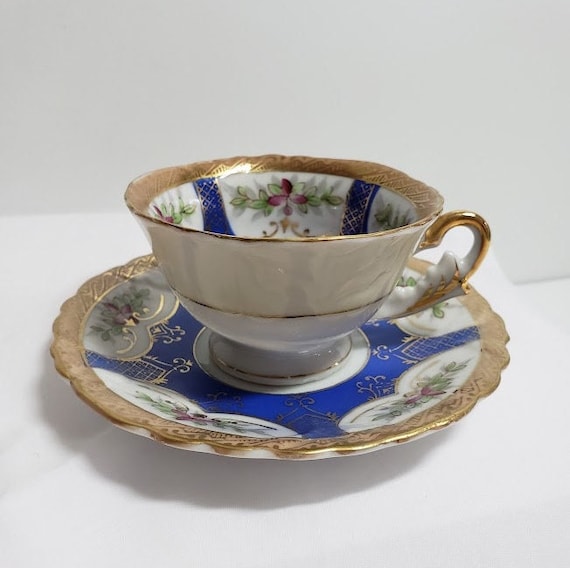 Vintage Floral Ucagco Demitasse Cup and Saucer with Gold Detailing Made in Japan Vintage Floral Ucagco Demitasse Cup and Saucer with Gold Detailing Made in Japan