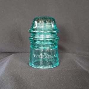 Vintage Amtel & Tel Co Glass Insulator, Blue Green color, Collectible