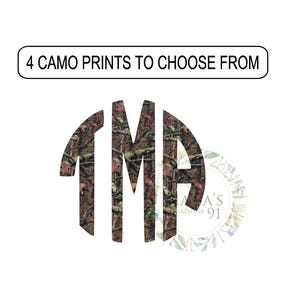 May include: A monogram with the letters "TMA" in a circle. The letters are filled with a camouflage pattern in shades of brown, green, and pink. The text "4 CAMO PRINTS TO CHOOSE FROM" is above the monogram.