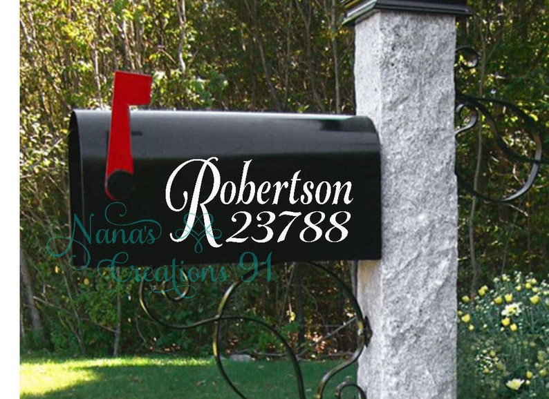May include: Black mailbox with a white vinyl decal that says "Robertson 23788".