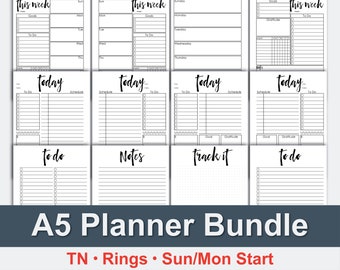 May include: A black and white A5 planner bundle with a variety of pages, including weekly spreads, daily spreads, to-do lists, and notes pages. The planner is designed for use with a ring binder and has a Sun/Mon start.