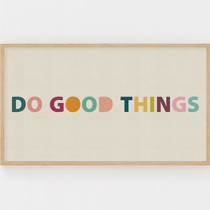 May include: A framed print with the text "DO GOOD THINGS" in colorful, bold letters. The letters are in shades of teal, pink, burgundy, orange, yellow, and green.