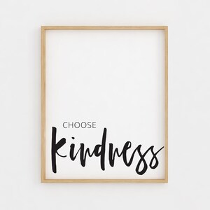 May include: A framed print with the text "CHOOSE kindness" in black script font on a white background.