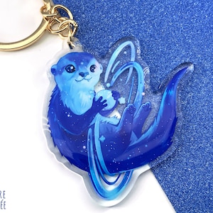 Cute otter keychain : acrylic charm of a space otter - animal lover gift, cute keychain, cute charm
