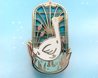 Cute goose pin -  cute pin of an animal standing in frond of a stained glass window - gold enamel brooch