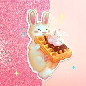 Sticker of a cute rabbit with a waffle