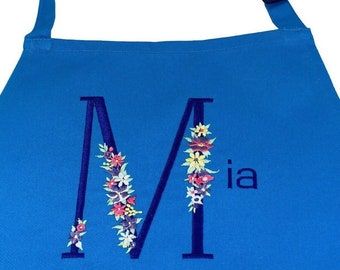 Personalised Apron With Floral Monogram. Kids or Adult Sizes. Choose floral lettering style, apron colour & initial letter to be embroidered