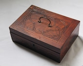 Vintage wooden box carved with oriental design