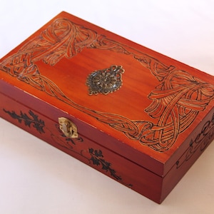 Vintage wooden box carved with Art Nouveau patterns
