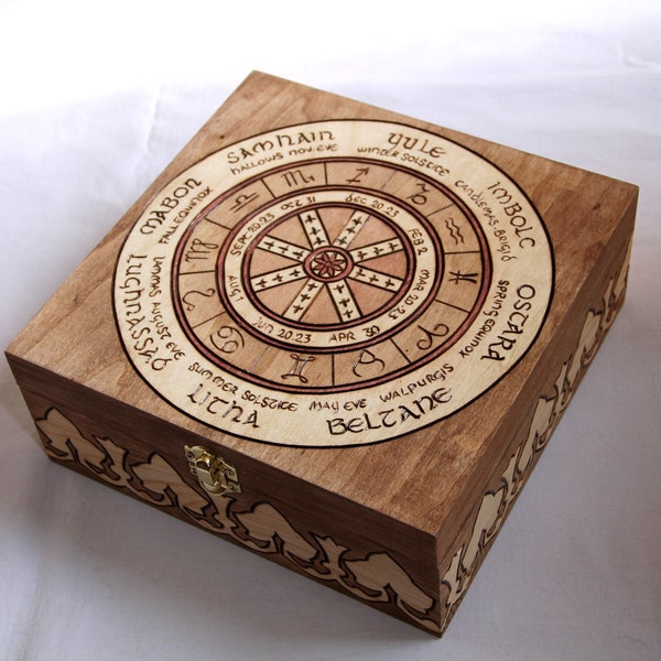 Wooden box carved with wheel of the year