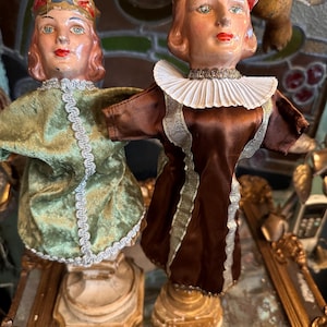 Two old handpuppets: a princess and prince.From France, around 1930
