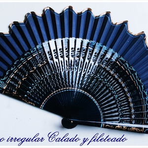 High range fretwork fan delicately filleting. Blue Navy. Spanish Flamenco