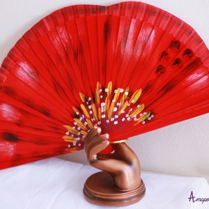 Hand-painted fan shaped like a poppy flower. Both faces. Flamenco Dance