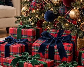May include: Several rectangular gift boxes wrapped in red, green, and blue plaid paper are stacked and arranged on the floor. Each box is tied with a wide, solid-colored velvet ribbon in either deep navy blue or dark forest green.
