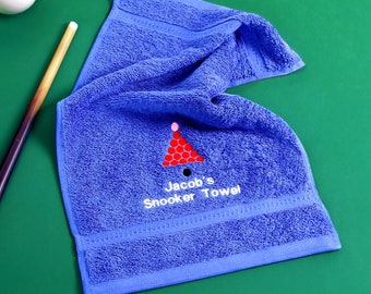 May include: Blue towel with a red and white snooker triangle and the text "Jacob's Snooker Towel" embroidered on it.