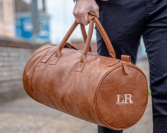 Faux Leather Barrel Bag With Personalised Luggage Tag By Duncan