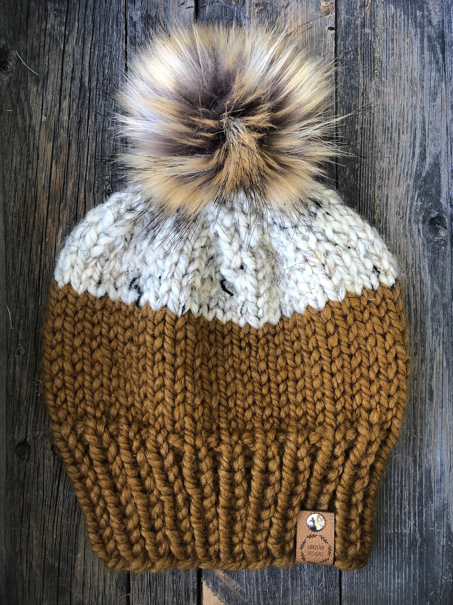 Custom hand-knitted hat with pom pom