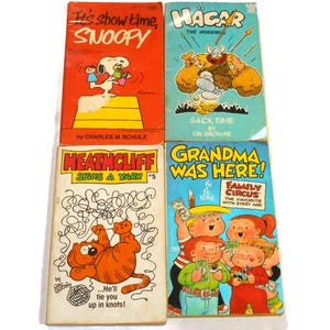 Four Paperback Comics: Snoopy, Heathcliff, Hagar, Family Circus Cartoons