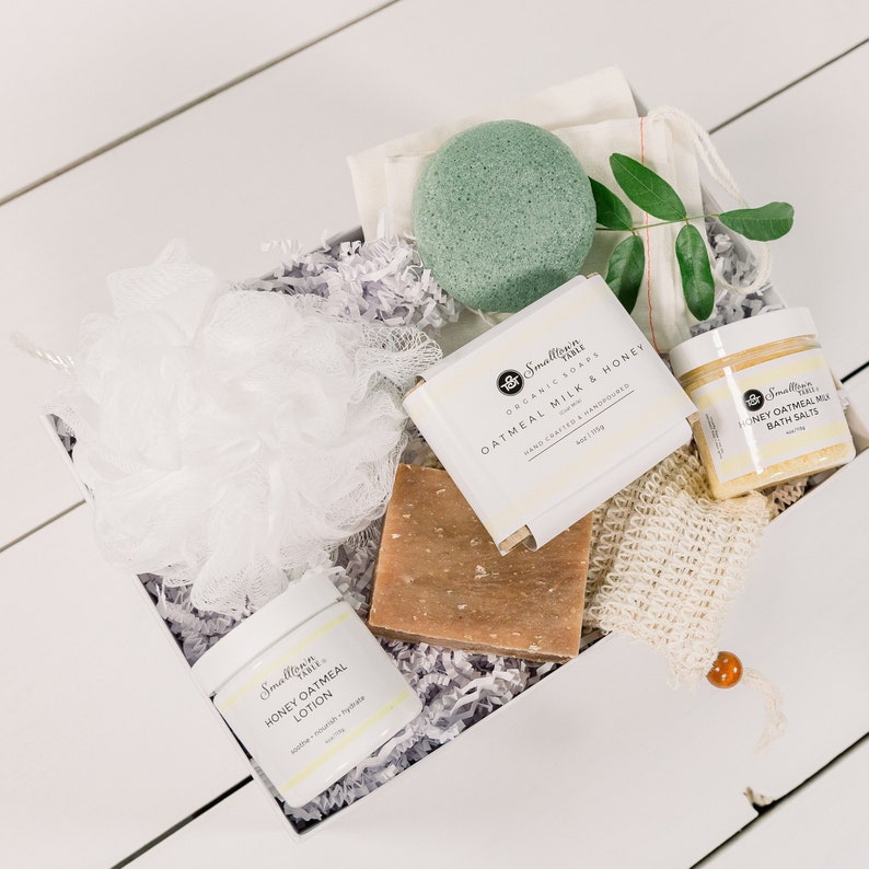 self care gift box for women shown with soap sack handmade goat milk soap bath salt body butter in white gift box a gorgeous present