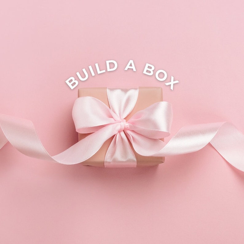 build a box Kraft wrapped in pink sating ribbon