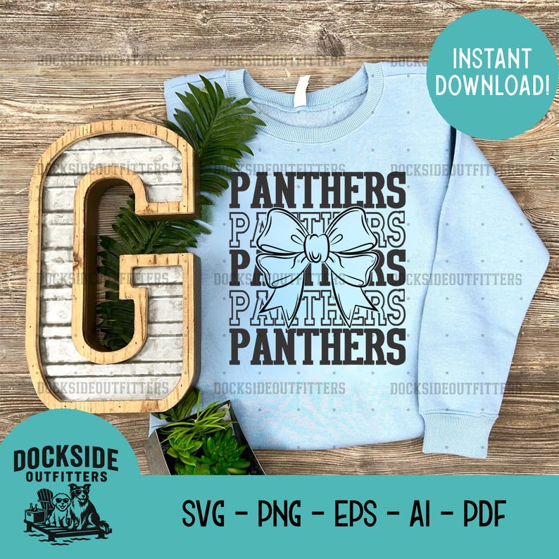 a light blue sweatshirt with the word "Panthers" printed on it, along with a wooden letter "G" and some greenery. The sweatshirt is placed on a wooden surface, and there is a plant and a wooden letter "G" nearby. The image also includes text that says "INSTANT DOWNLOAD" and "DOCKSIDE OUTFITTERS" along with various file formats such as "SVG", "PNG", "EPS", "AI", and "PDF".
