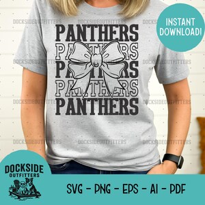A gray t-shirt with the word "Panthers" printed in large black letters, along with a large bow graphic. The t-shirt appears to be a graphic tee or a printed item.