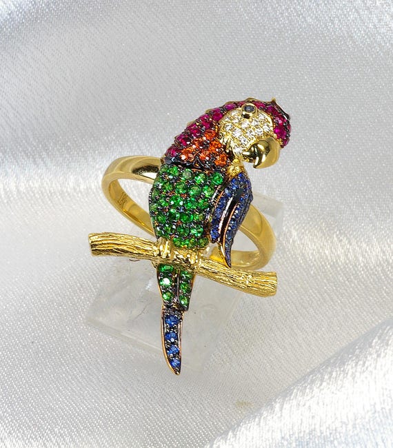 Gold bird ring best sale