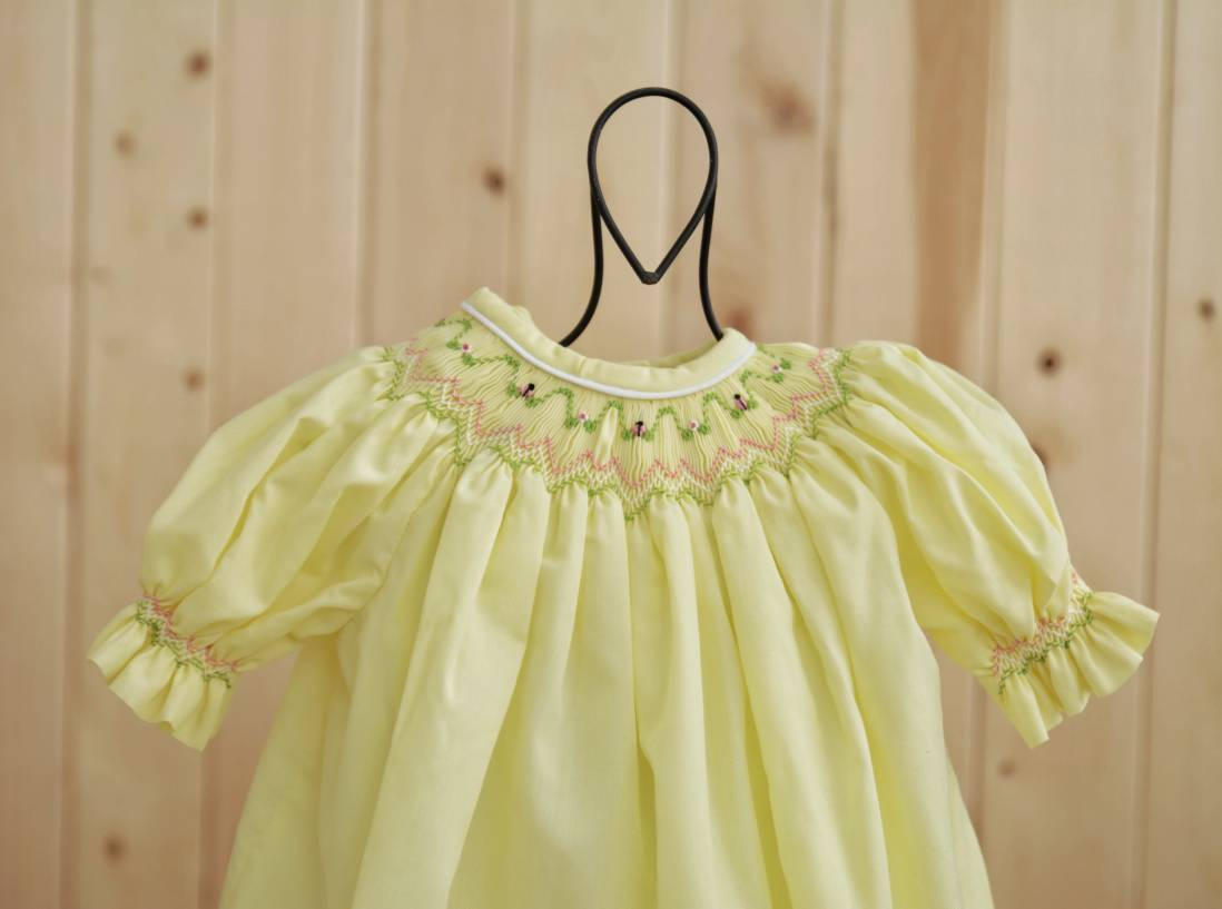 yellow smocked baby dress