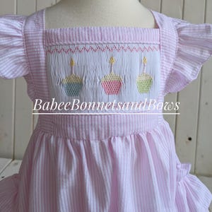 Little girl&#39;s birthday bubblesuit.   Ruffle bottom bubblesuit.  Pink stripe seersucker bubble. Smocked cupcake bubblesuit.