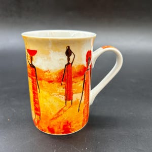 Masterpiece Collection Coffee Mug African Tribal Women Orange Yellow Masterpiece Collection Coffee Mug African Tribal Women Orange Yellow