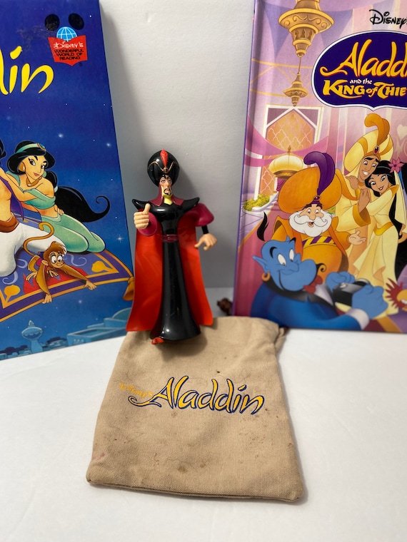ヴィンテージ ディズニーのアラジンの本とジャファーのフィギュア 4 個
