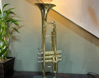 Vintage trumpet crafted into accent lamp