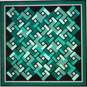 May include: A geometric pattern with a repeating design of overlapping squares in shades of green and white on a black background. The pattern is framed by a dark green border.