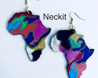 May include: A pair of wooden earrings in the shape of the African continent. The earrings are painted with a colorful abstract design in shades of red, blue, purple, green, and gold. The word "Neckit" is printed on the image.