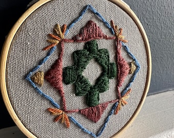 Handmade mini embroidery art in Southwestern geometric style