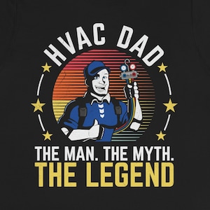 Puede incluir: Camiseta negra con un gráfico retro de una persona con un uniforme azul y sosteniendo herramientas. El texto "HVAC DAD THE MAN. THE MYTH. THE LEGEND" está impreso en amarillo.