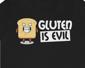 May include: Black t-shirt with the text "GLUTEN IS EVIL" in white. A cartoon illustration of a slice of bread with a face is on the left side of the text. The bread has a menacing expression.
